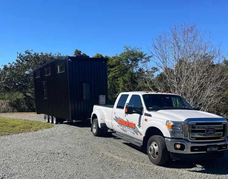 Maroochydore Towing relocating a tiny home on a rural Sunshine Coast property