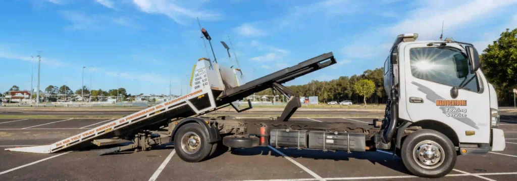 Maroochydore Towing tilt tray truck ready for all vehicle transport across the Sunshine Coast